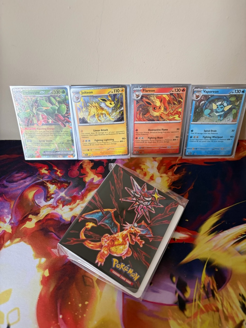 Pokémon Charizard mini binder and cards